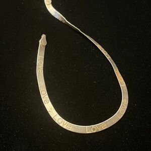 Ralph Lauren 925 silver color snake chain necklace with a touch of gold color